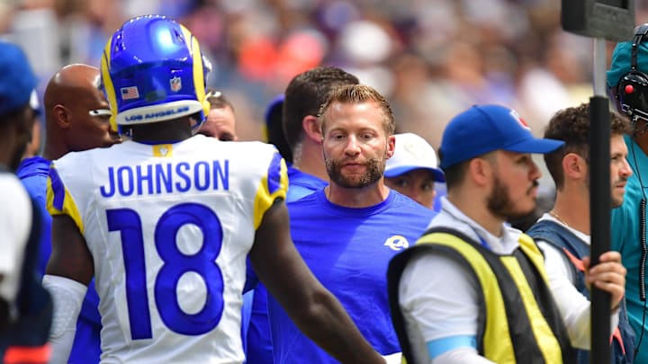 Aug 11, 2024; Inglewood, California, USA; Los Angeles Rams head coach Sean McVay speaks with wide receiver Tyler Johnson (18) during the first half at SoFi Stadium. Mandatory Credit: Gary A. Vasquez-Imagn Images