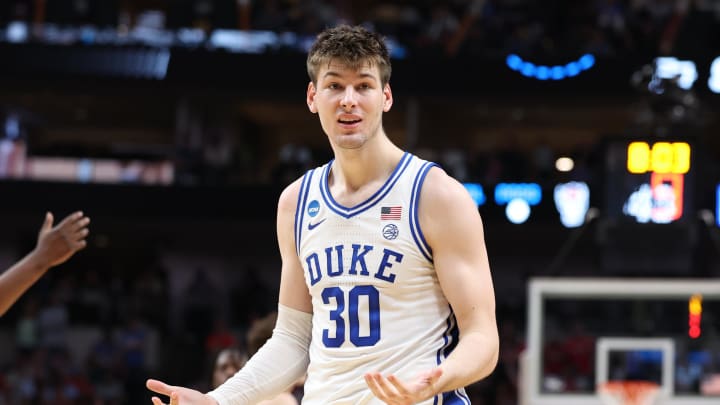 Mar 31, 2024; Dallas, TX, USA; Duke Blue Devils center Kyle Filipowski (30) reacts in the second half against the North Carolina State Wolfpack in the finals of the South Regional of the 2024 NCAA Tournament at American Airline Center. Mandatory Credit: Tim Heitman-USA TODAY Sports