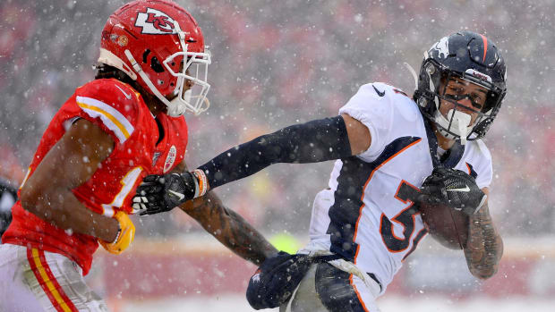 Denver Broncos free safety Justin Simmons (31) intercepts a pass intended against the Kansas City Chiefs 