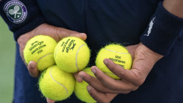 Jul 2, 2025; Wimbledon, United Kingdom; Balls in the hands of a bal person during the Marketa Vondrousova of the Czech Republ