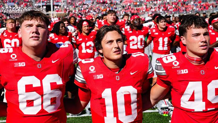 Ohio State Buckeyes quarterback Julian Sayin (10) celebrates with teammates after defeating Illinois Fighting Illini in the NCAA football game at Ohio Stadium on Sept. 26, 2026 in Columbus, Ohio.