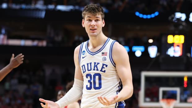 Mar 31, 2024; Dallas, TX, USA; Duke Blue Devils center Kyle Filipowski (30) reacts in the second half against the North Carolina State Wolfpack in the finals of the South Regional of the 2024 NCAA Tournament at American Airline Center. Mandatory Credit: Tim Heitman-USA TODAY Sports
