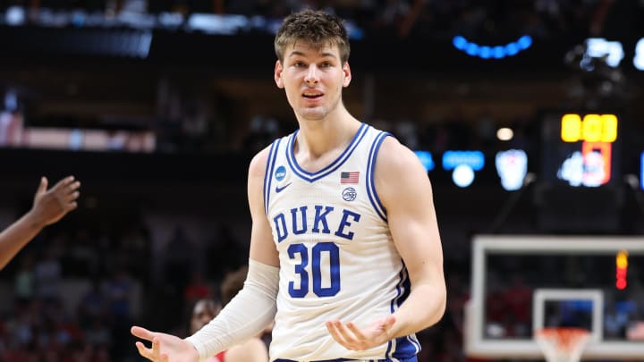 Mar 31, 2024; Dallas, TX, USA; Duke Blue Devils center Kyle Filipowski (30) reacts in the second half against the North Carolina State Wolfpack in the finals of the South Regional of the 2024 NCAA Tournament at American Airline Center. 