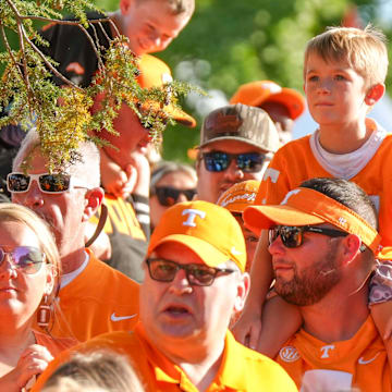 A young Tennessee fan sits on shoulders during the Vol Walk before Tennessee's game against Kent State in Neyland Stadium in Knoxville on Saturday, Sept. 14, 2024.