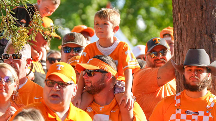 A young Tennessee fan sits on shoulders during the Vol Walk before Tennessee's game against Kent State in Neyland Stadium in Knoxville on Saturday, Sept. 14, 2024.