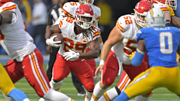 Sep 29, 2024; Inglewood, California, USA;  Kansas City Chiefs running back Kareem Hunt (29) carries the ball for a short gain in the second half against the Los Angeles Chargers at SoFi Stadium. Mandatory Credit: Jayne Kamin-Oncea-Imagn Images
