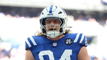 Oct 12, 2025; Indianapolis, Indiana, USA; Indianapolis Colts tight end Tyler Warren (84) celebrates after scoring a touchdown against the Arizona Cardinals during the first quarter of the game at Lucas Oil Stadium. 