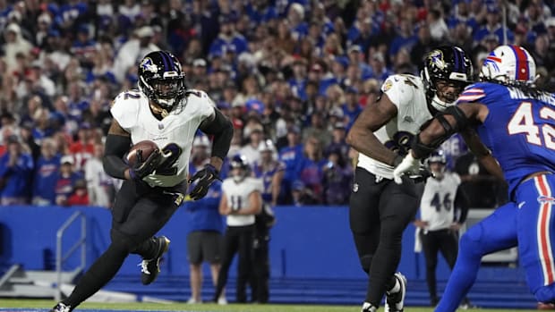 Baltimore Ravens running back Derrick Henry gets a block from tight end Zaire Mitchell-Paden on touchdown run in Week 1.