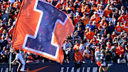 Nov 2, 2024; Champaign, Illinois, USA;  The running of the flags for the Illinois Fighting Illini during the second half against the Minnesota Golden Gophers at Memorial Stadium. Mandatory Credit: Ron Johnson-Imagn Images