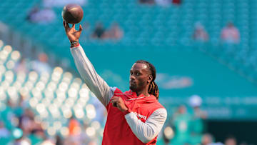 Nov 24, 2024; Miami Gardens, Florida, USA; New England Patriots quarterback Joe Milton III (19) throws the football before the game against the Miami Dolphins at Hard Rock Stadium.