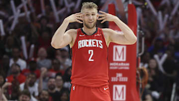 Apr 2, 2025; Houston, Texas, USA; Houston Rockets center Jock Landale (2) reacts after a basket made by guard Reed Sheppard (not pictured) during the fourth quarter against the Utah Jazz at Toyota Center. Mandatory Credit: Troy Taormina-Imagn Images