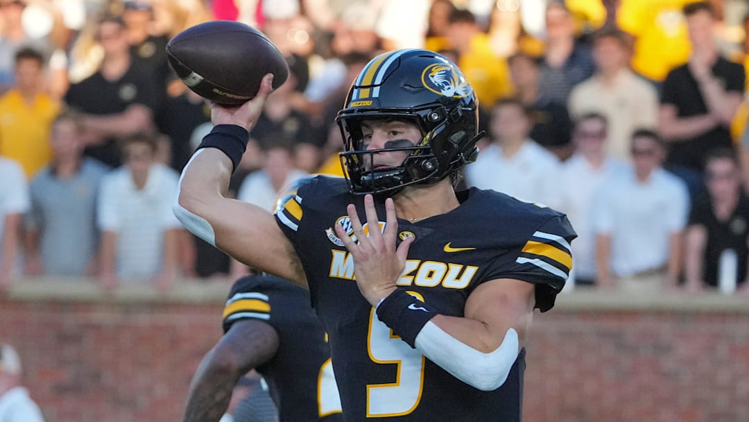 Aug 28, 2025; Columbia, Missouri, USA; Missouri Tigers quarterback Beau Pribula (9) throws a pass against the Central Arkansas Bears during the first half of the game at Faurot Field at Memorial Stadium. Mandatory Credit: Denny Medley-Imagn Images