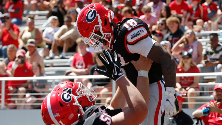 Georgia wide receiver Sacovie White (18) celebrates with his teammates after scoring touchdown during the G-Day spring football game in Athens, Ga., on Saturday, April 13, 2024. The game ended in a tie.