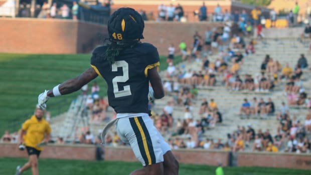 Missouri Tigers wide receiver (2) fields a pass at the team's annual fan night practice at Faurot Field. 