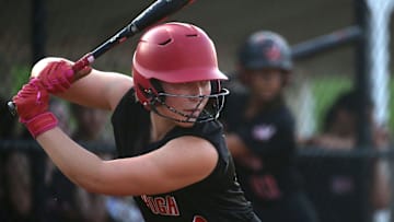 Iowa City High’s Molly Carlson, 20, warms up before taking an at bat against Waterloo West Thursday, July 11, 2024 in Iowa City, Iowa.
