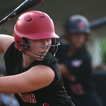 Iowa City High’s Molly Carlson, 20, warms up before taking an at bat against Waterloo West Thursday, July 11, 2024 in Iowa City, Iowa.