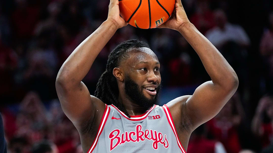 Ohio State Buckeyes guard Bruce Thornton (2) celebrates with Dennis Hopson after becoming Ohio State men's basketball's all-time leading scorer in the first half of the NCAA game at Value City Arena on Saturday, March 7, 2026 in Columbus, Ohio.