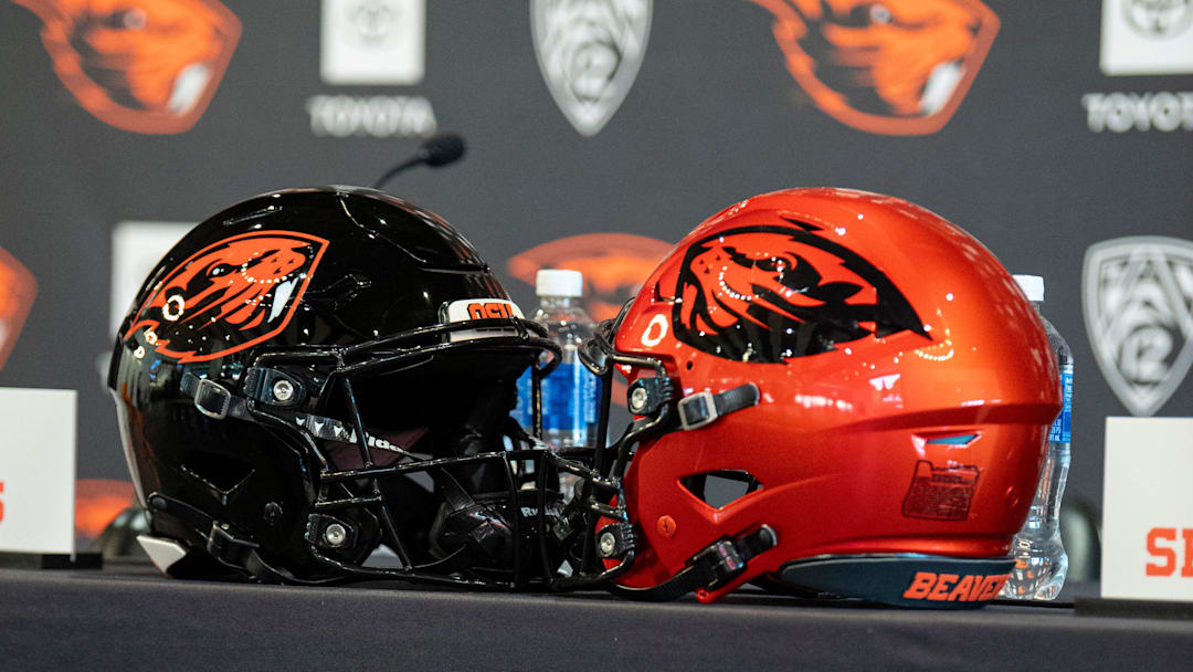 Oregon State football helmets sit on a table before the introductory press conference of the hiring of its new head football coach, JaMarcus Shephard, at Reser Stadium on Tuesday, Dec. 2, 2025, in Corvallis, Ore.