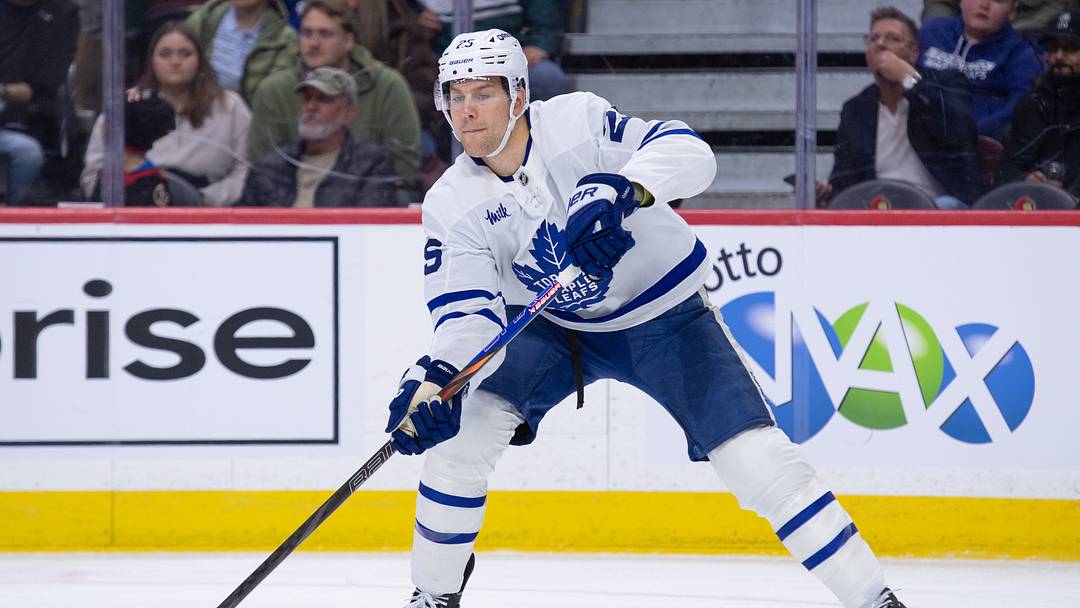 Mar 21, 2026; Ottawa, Ontario, CAN; Toronto Maple Leafs defenseman Brandon Carlo (25) shoots the puck in the first period against the Ottawa Senators at the Canadian Tire Centre. Mandatory Credit: Marc DesRosiers-IMAGN Images