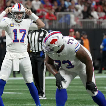 Oct 13, 2025; Atlanta, Georgia, USA; Buffalo Bills quarterback Josh Allen (17) at the line of scrimmage against the Atlanta Falcons