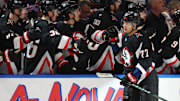 Apr 17, 2025; Buffalo, New York, USA;  Buffalo Sabres right wing JJ Peterka (77) celebrates his goal with teammates during the third period against the Philadelphia Flyers at KeyBank Center. Mandatory Credit: Timothy T. Ludwig-Imagn Images