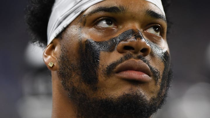 Aug 12, 2022; Detroit, Michigan, USA; Atlanta Falcons linebacker Quinton Bell (56) watches the offense from the sidelines during their preseason game against the Detroit Lions at Ford Field.