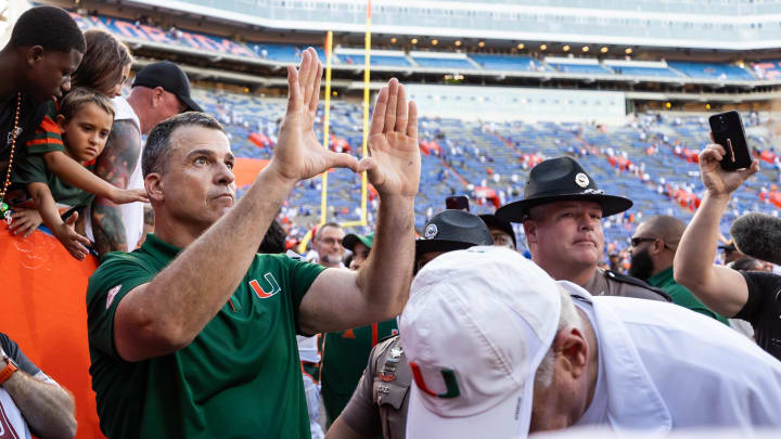 Aug 31, 2024; Gainesville, Florida, USA; Miami Hurricanes head coach Mario Cristobal gestures after a game against the Florida Gators at Ben Hill Griffin Stadium.