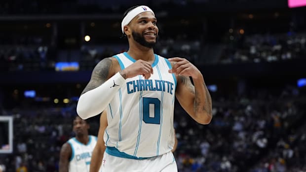 Charlotte Hornets forward Miles Bridges (0) reacts in the second half against the Denver Nuggets at Ball Arena