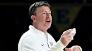 Vanderbilt basketball head coach Mark Byington talks to his players during an NCAA college basketball game against California Wednesday, Nov. 13, 2024, in Nashville, Tenn.