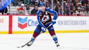 Oct 18, 2024; Denver, Colorado, USA; Colorado Avalanche defenseman Cale Makar (8) controls the puck in the second period against the Anaheim Ducks at Ball Arena. Mandatory Credit: Ron Chenoy-Imagn Images