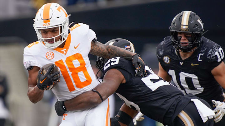 Tennessee running back DeSean Bishop (18) is stopped by Vanderbilt edge Miles Capers (29) during the third quarter at FirstBank Stadium in Nashville, Tenn., Saturday, Nov. 30, 2024. Tennessee running back DeSean Bishop (18) is stopped by Vanderbilt edge Miles Capers (29) during the third quarter at FirstBank Stadium in Nashville, Tenn., Saturday, Nov. 30, 2024.