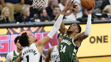 Jan 31, 2025; San Antonio, Texas, USA; Milwaukee Bucks forward Giannis Antetokounmpo (34) drives to the basket against San Antonio Spurs center Victor Wembanyama (1) during the second half at Frost Bank Center. Mandatory Credit: Scott Wachter-Imagn Images