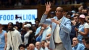 UNC basketball head coach Hubert Davis versus Duke