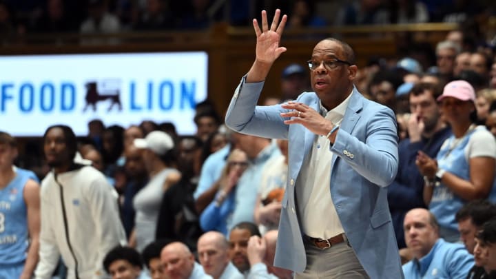 UNC basketball head coach Hubert Davis versus Duke