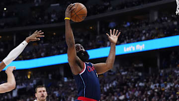 Apr 29, 2025; Denver, Colorado, USA; LA Clippers guard James Harden (1) pulls in a rebound in the second half against the Denver Nuggets during game five of the first round for the 2025 NBA Playoffs at Ball Arena. Mandatory Credit: Ron Chenoy-Imagn Images
