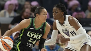 Sep 11, 2025; Minneapolis, Minnesota, USA; Minnesota Lynx forward Napheesa Collier (24) dribbles against Golden State Valkyries center Temi Fagbenle (14) in the first half at Target Center. Mandatory Credit: Jesse Johnson-Imagn Images