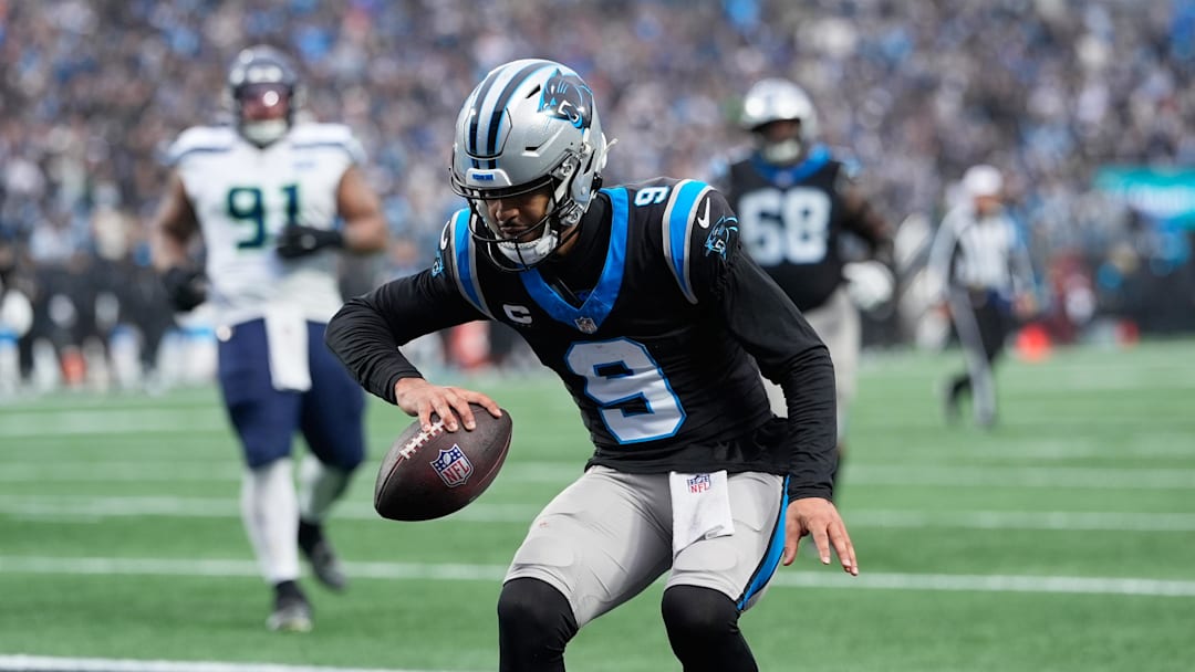 Dec 28, 2025; Charlotte, North Carolina, USA; Carolina Panthers quarterback Bryce Young (9) reacts after scoring a ten-yard rushing touchdown against the Seattle Seahawks during the third quarter at Bank of America Stadium. Mandatory Credit: Jim Dedmon-Imagn Images
