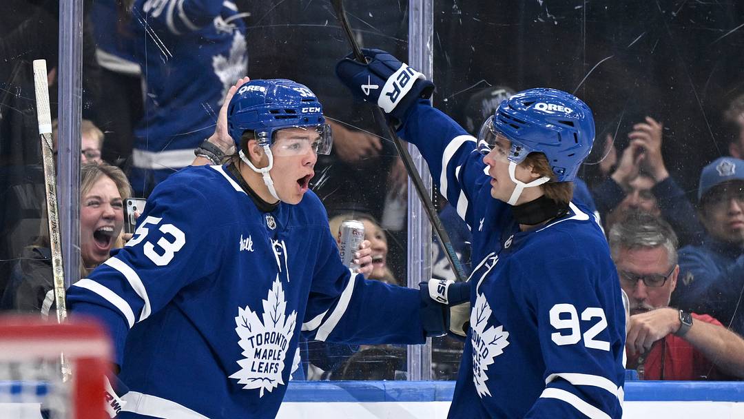 Sep 30, 2026; Toronto, Ontario, CAN;  Toronto Maple Leafs forward Easton Cowan (53) celebrates with forward Gavin McKenna (92) after scoring a goal against the New York Islanders in the first period at Scotiabank Arena.  Mandatory Credit: Dan Hamilton-Imagn Images