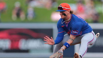 Feb 23, 2025; West Palm Beach, Florida, USA; New York Mets second baseman Jett Williams (90) catches a ground ball and retires Washington Nationals second baseman Luis Garcia Jr. (not pictured) during the third inning at CACTI Park of the Palm Beaches. Mandatory Credit: Sam Navarro-Imagn Images