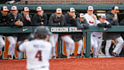 The Oregon State baseball team watches their teammate Dallas Macias (4) at bat duringÊthe NCAA college baseball game at Goss Stadium on Friday,ÊApril 26, 2024, in Corvallis, Ore.