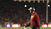 Oct 19, 2024; College Park, Maryland, USA;  Southern California Trojans head coach Lincoln Riley walks onto the field during the second half Maryland Terrapins at SECU Stadium. Mandatory Credit: Tommy Gilligan-Imagn Images