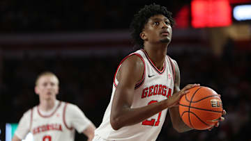 Nov 14, 2025; Athens, Georgia, USA; Georgia Bulldogs forward Jake Wilkins (21) shoots a free throw against the Georgia Tech Yellow Jackets during the first half at Stegeman Coliseum. Mandatory Credit: Mady Mertens-Imagn Images