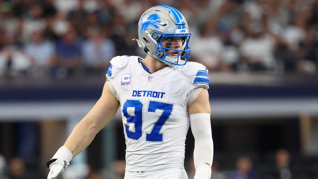 Oct 13, 2024; Arlington, Texas, USA; Detroit Lions defensive end Aidan Hutchinson (97) in action during the game against the Dallas Cowboys at AT&T Stadium. Mandatory Credit: Kevin Jairaj-Imagn Images