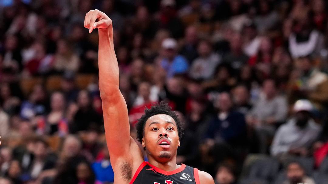 Nov 21, 2025; Toronto, Ontario, CAN;  Scottie Barnes (4) of the Toronto Raptors tracks his shot against the Washington Wizards during the second half at Scotiabank Arena. Mandatory Credit: Kevin Sousa-Imagn Images