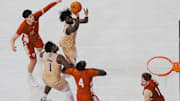 Zoom Diallo lets go of a shot against Nebraska at Alaska Airlines Arena. 