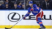 May 22, 2024; New York, New York, USA; New York Rangers defenseman Jacob Trouba (8) controls the puck against the Florida Panthers during the third period of game one of the Eastern Conference Final of the 2024 Stanley Cup Playoffs at Madison Square Garden. Mandatory Credit: Brad Penner-Imagn Images