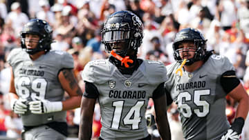 Sep 30, 2023; Boulder, Colorado, USA; Colorado Buffaloes wide receiver Omarion Miller (14) celebrates his touchdown during the game against the USC Trojans at Folsom Field. Mandatory Credit: Chet Strange-Imagn Images