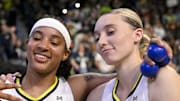 Dallas Wings guard Aziaha James and guard Paige Bueckers.