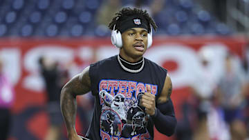 Nov 10, 2024; Houston, Texas, USA; Houston Texans wide receiver Tank Dell (3) wears a shirt with wide receiver Stefon Diggs (1) before the game against the Detroit Lions at NRG Stadium. Mandatory Credit: Troy Taormina-Imagn Images
