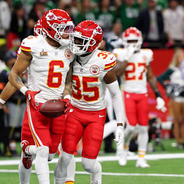 Feb 9, 2025; New Orleans, LA, USA; Kansas City Chiefs safety Bryan Cook (6) is congratulated by cornerback Jaylen Watson (35) after making an interception against the Philadelphia Eagles during the first half of Super Bowl LIX at Caesars Superdome. Mandatory Credit: Geoff Burke-Imagn Images